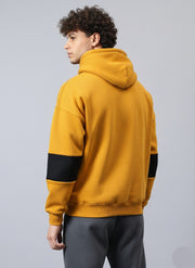 A Man Wearing mustard hodie back side view loopspk
